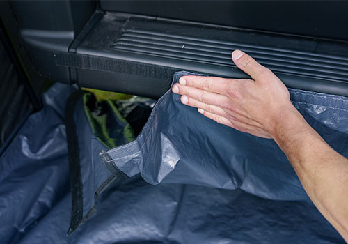 grondzeil met klitteband aan ducato kleptent Obelink